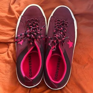 burgundy and magenta converse tennis shoes